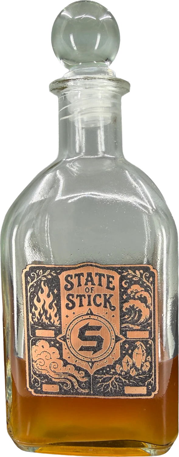 A glass bottle carrying a low-profile engraved State of Stick connected emblem
